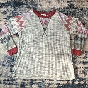 Haptics Long Sleeve Henley with Aztec sleeves and around neck.